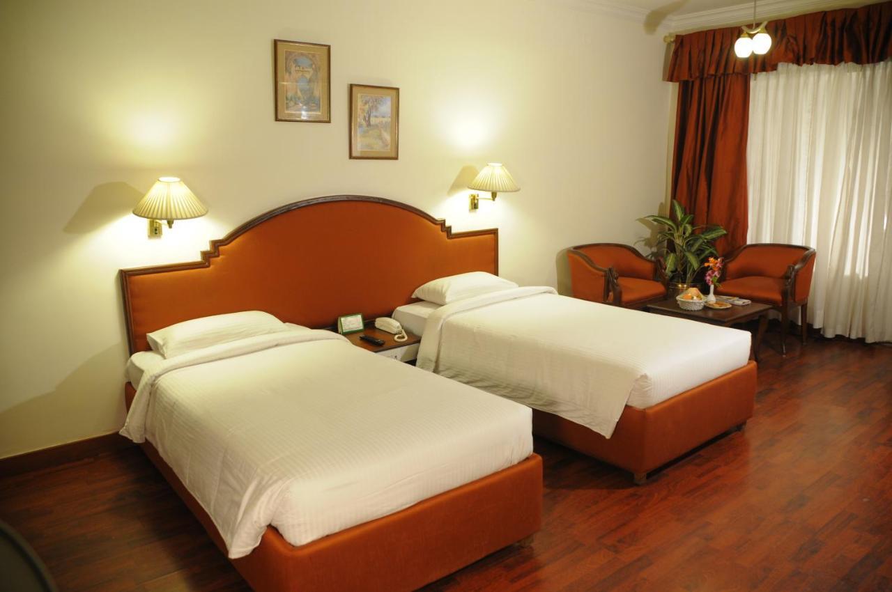Nalapad'S Hotel Bangalore International - Managed By Olive Room photo